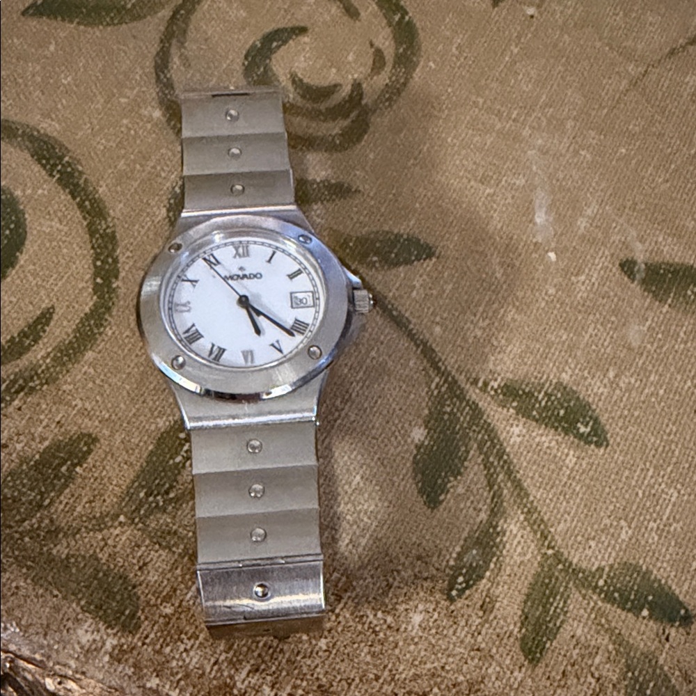 Movado Silver and White watch